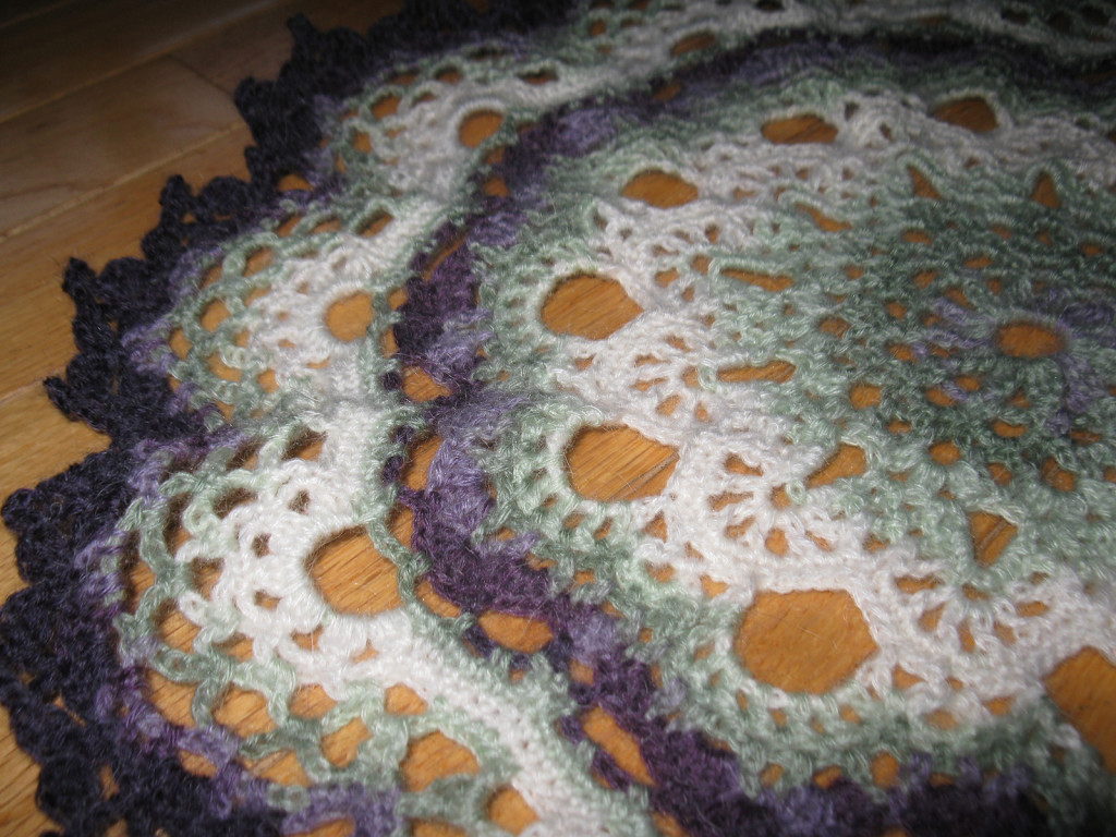 purple, green, and white doily